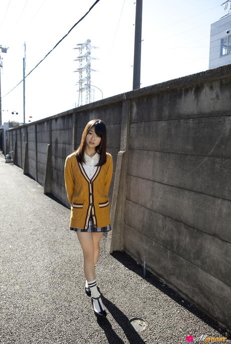 Perfect Asian Momoko Miduki strips off her yellow jacket and white panties