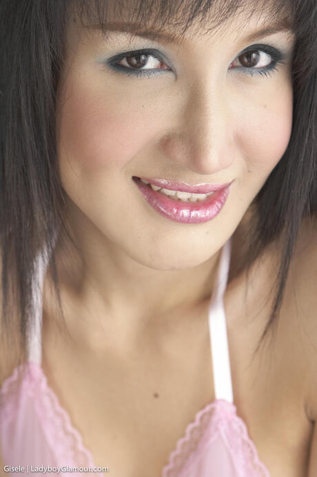 Sexy shemale Gisele shows off her perfect booty and her big dick in a solo